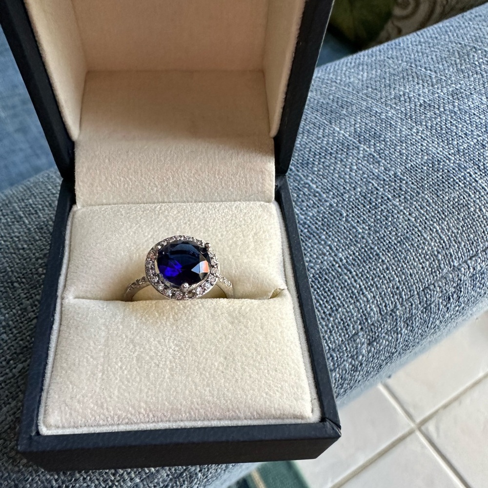Dazzling Silver Ring with Deep Blue Stone